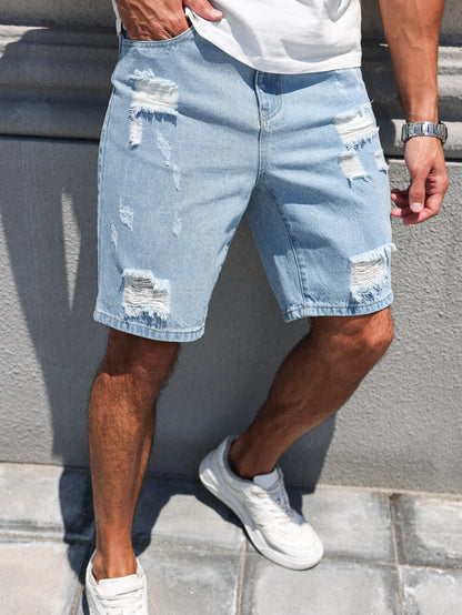 Pantalones cortos vaqueros de búfalo de agua lavados con agujeros