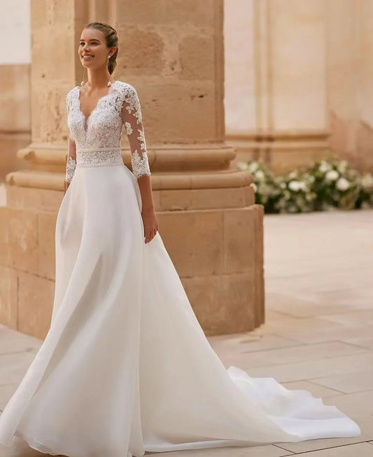 Vestidos de novia elegantes personalizados de Flavinke con escote en V