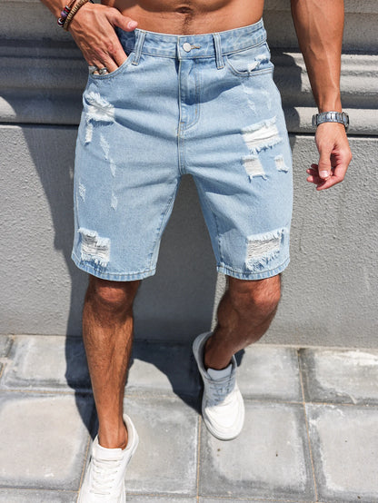 Pantalones cortos vaqueros de búfalo de agua lavados con agujeros