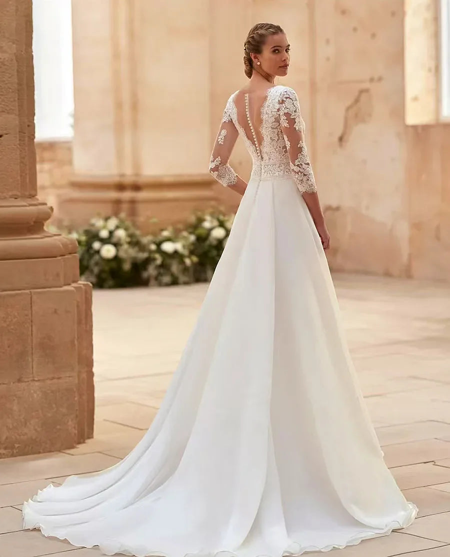 Vestidos de novia elegantes personalizados de Flavinke con escote en V