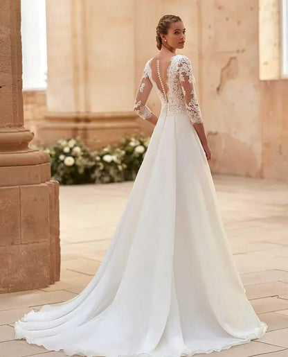 Vestidos de novia elegantes personalizados de Flavinke con escote en V