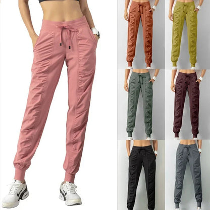 Pantalones deportivos de tela con cordón ajustable para correr