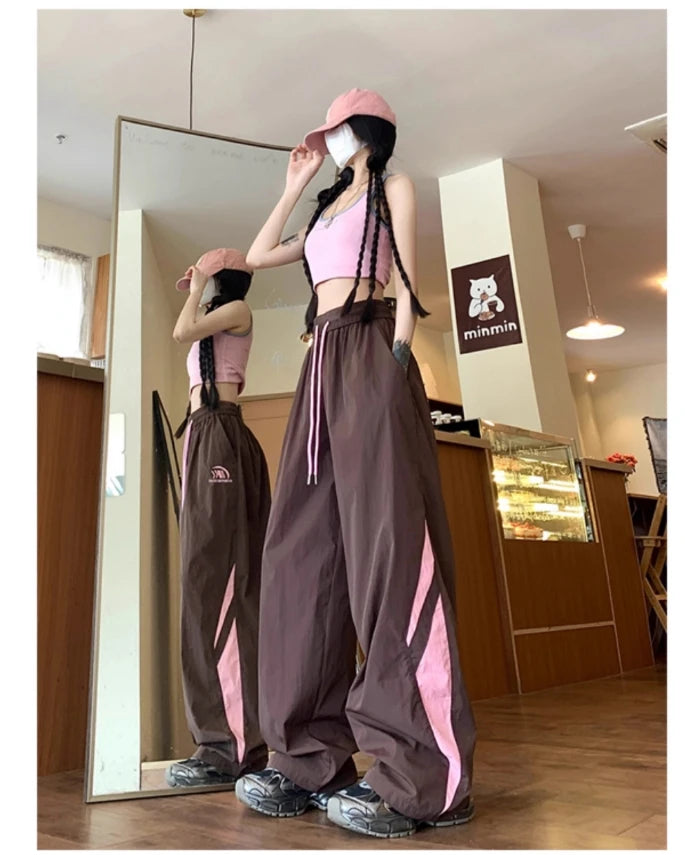 Elegantes pantalones deportivos anchos y ajustados