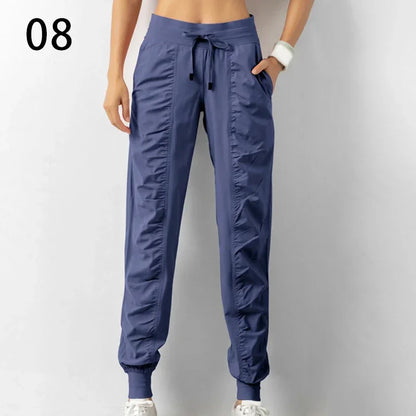 Pantalones deportivos de tela con cordón ajustable para correr