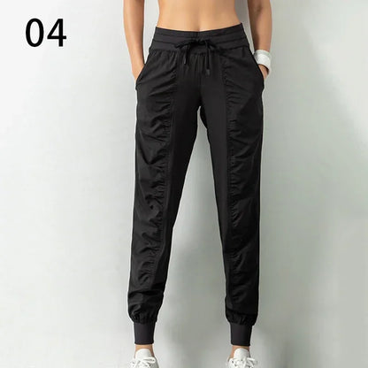 Pantalones deportivos de tela con cordón ajustable para correr
