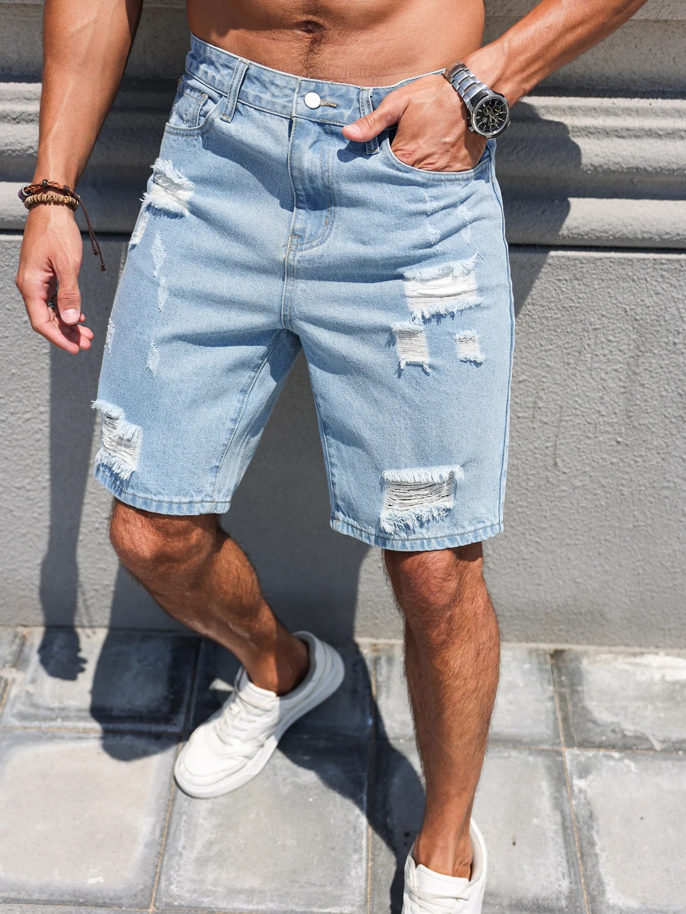 Pantalones cortos vaqueros de búfalo de agua lavados con agujeros