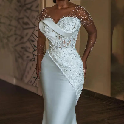 Vestidos de novia de lujo personalizados con cuentas de encaje, mangas largas