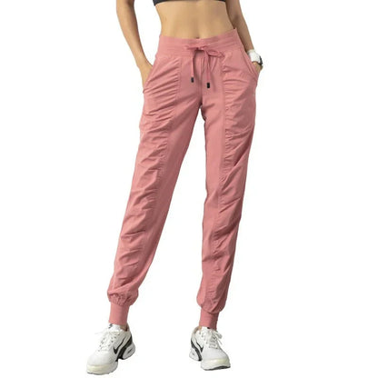 Pantalones deportivos de tela con cordón ajustable para correr