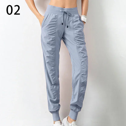 Pantalones deportivos de tela con cordón ajustable para correr